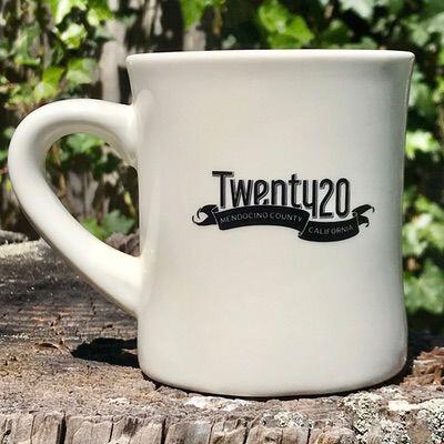 A white coffee mug with the word twenty20 on it.